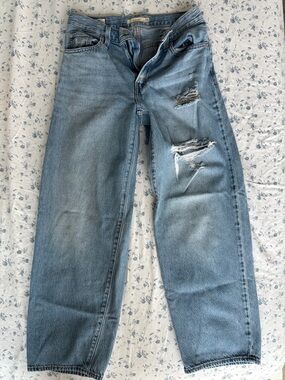 Levi's Light Blue Distressed Women's Relaxed Jeans from Aritzia